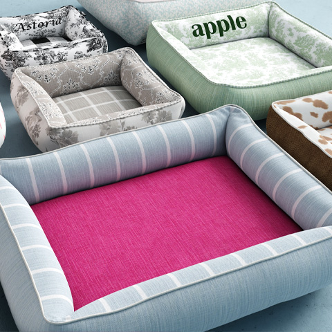 Cozy cuddle dog bed with a dog resting inside