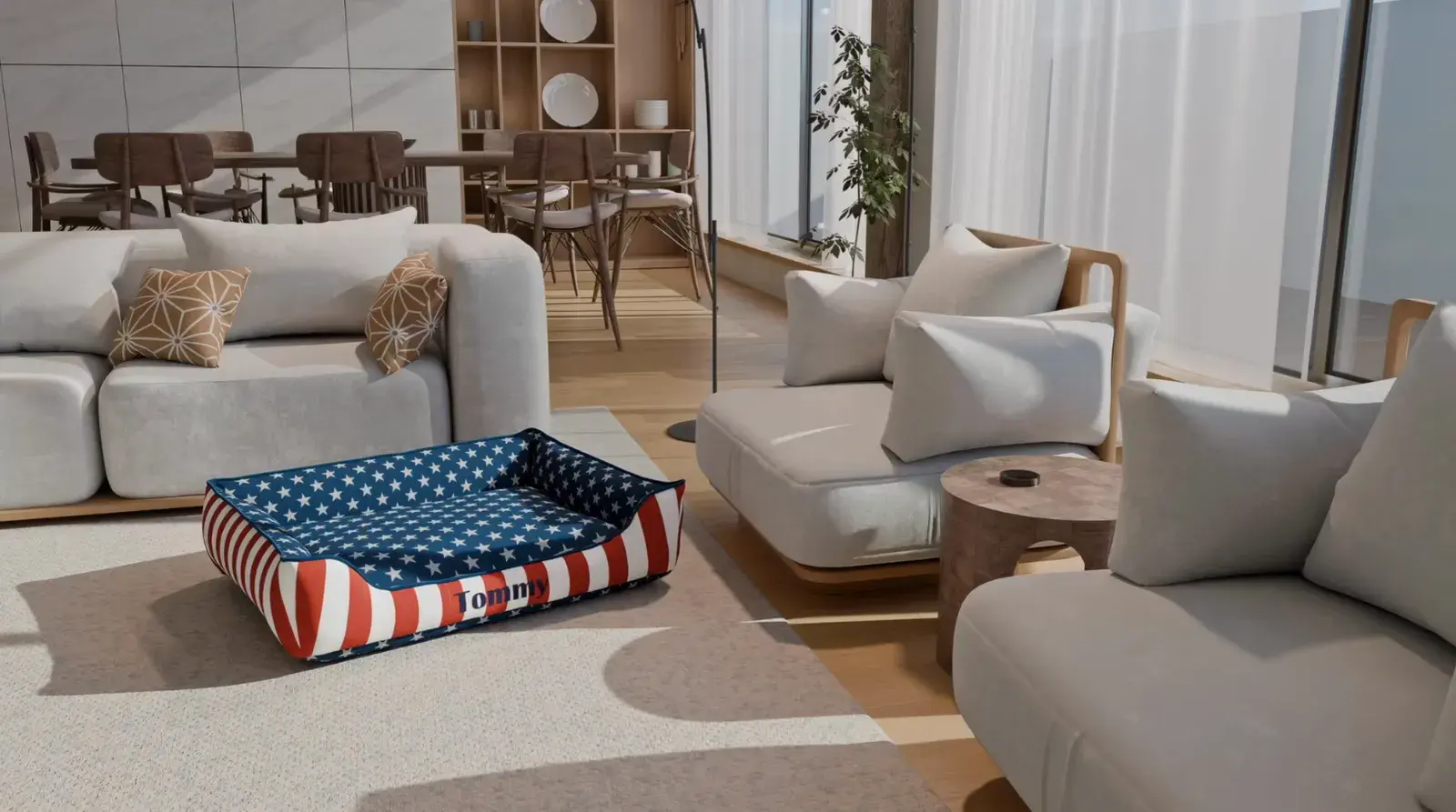 A Cuddle Bed in stars and stripes, embroidered Tommy, in a living room