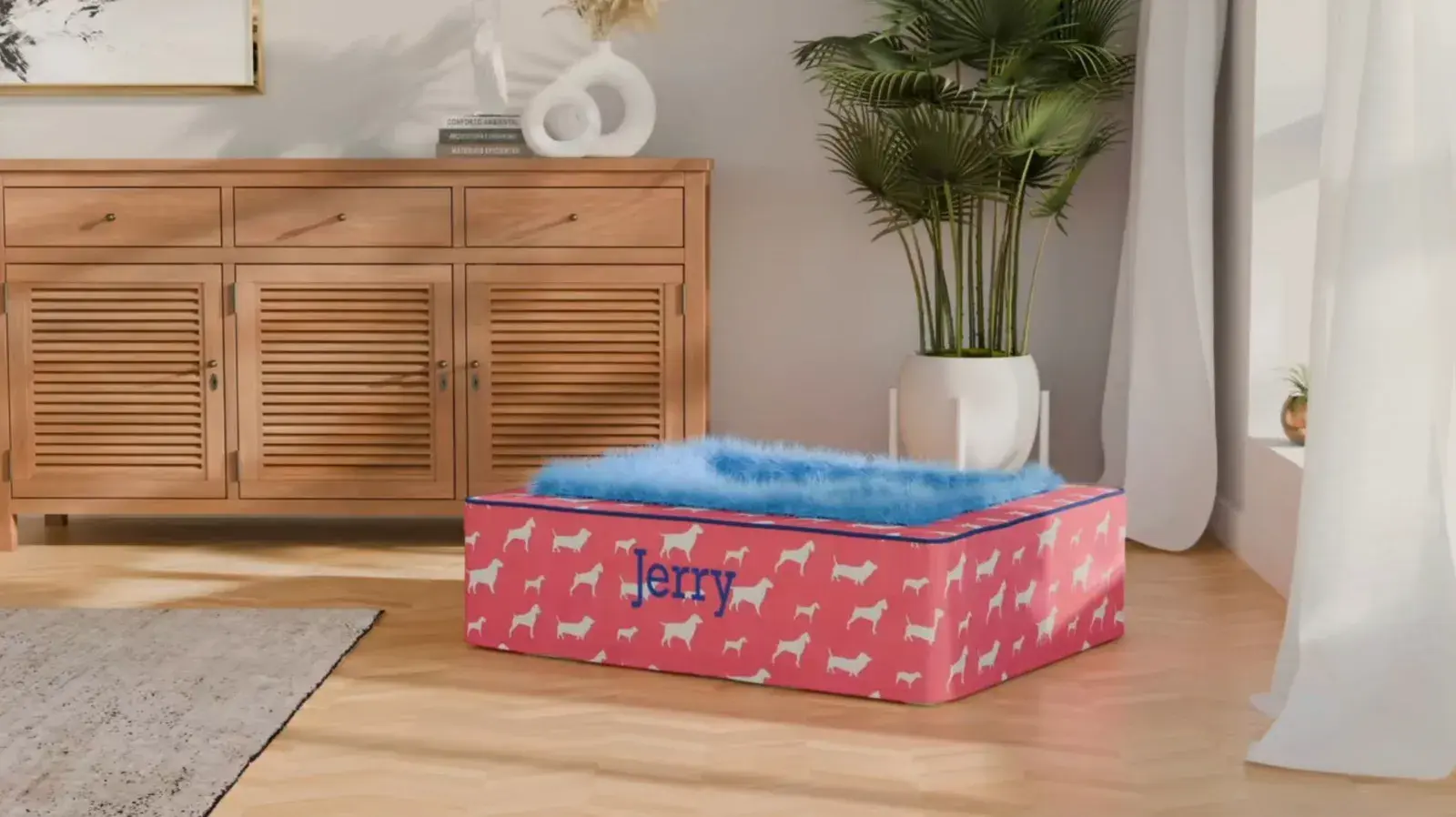 A Throne Bed in a pink dog print with blue fur, embroidered Jerry