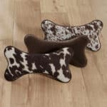 brown faux cowhide dog bone pillows