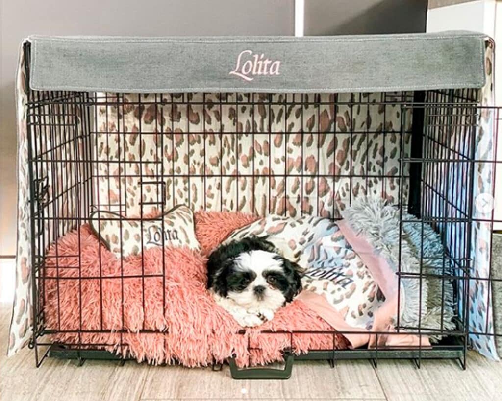 pink and grey dog crate cover